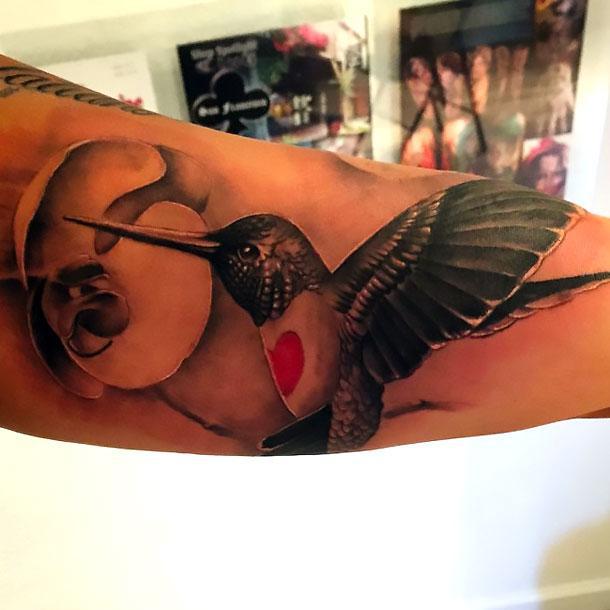 Black and Gray Hummingbird on Forearm Tattoo Idea
