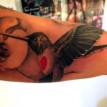 Black and Gray Hummingbird on Forearm Tattoo