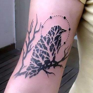 Blackbird on Bicep Tattoo