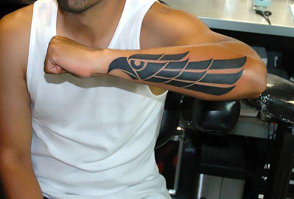 Black Eagle on Forearm Tattoo Idea
