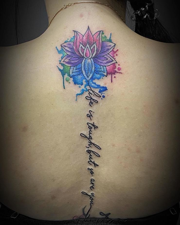Splashy and Symbolic Lotus Tattoo Idea