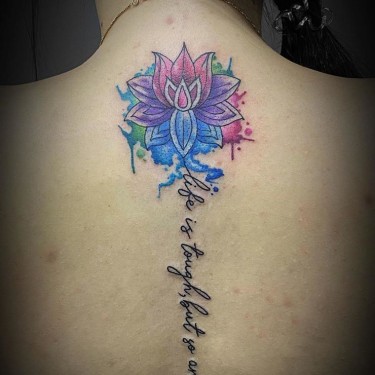 Splashy and Symbolic Lotus Tattoo