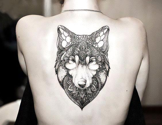 Best Girly Wolf Face on Back Tattoo Idea