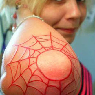 Red Ink  Spider Web On Elbow Tattoo