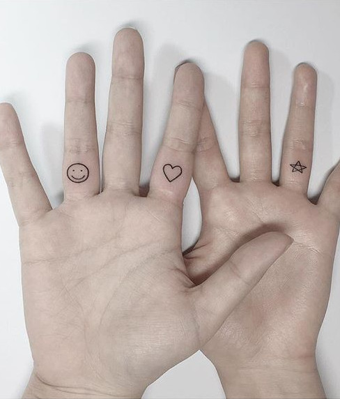 Smiley, Heart, and Star on Fingers Tattoo Idea