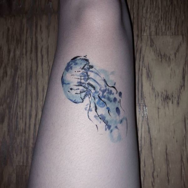 Small Blue Jellyfish Tattoo Idea