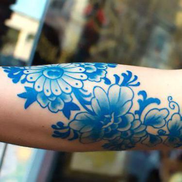 Blue Ink Flowers Tattoo