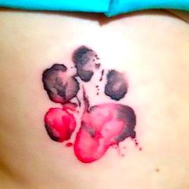 Black and Red Puppy Paw Print Tattoo