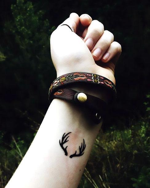 Black Deer Antler on Wrist Tattoo Idea