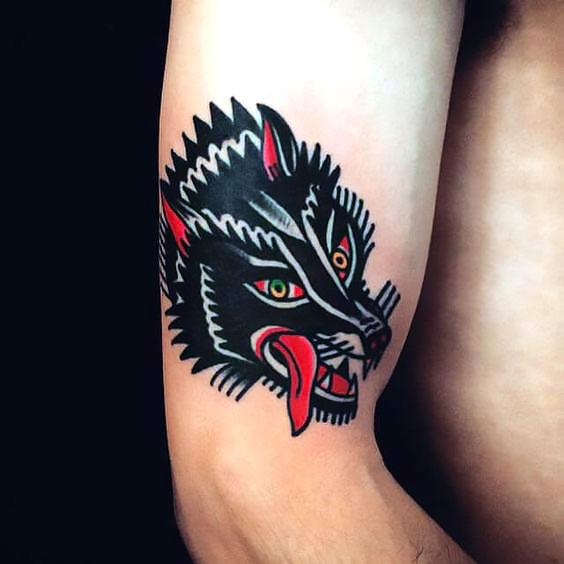 Black Traditional Wolf Tattoo Idea