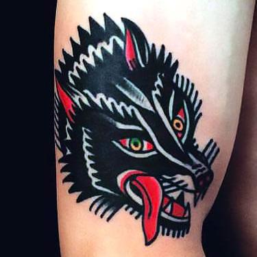 Black Traditional Wolf Tattoo
