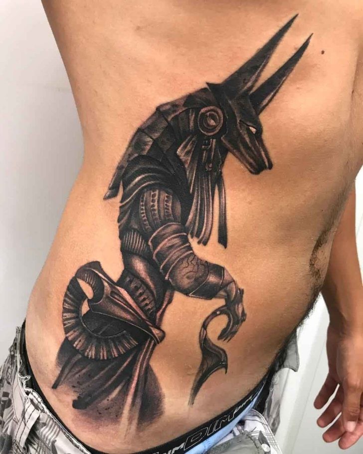 Anubis On Ribs Tattoo Idea