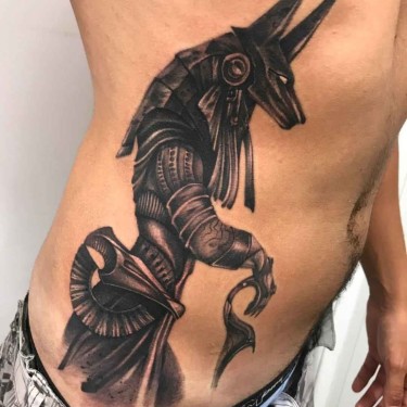 Anubis On Ribs Tattoo
