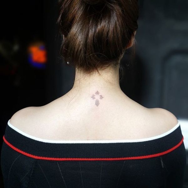 Female Linework Cross Tattoo Idea
