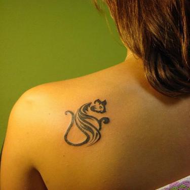 Small Tribal Cat Tattoo