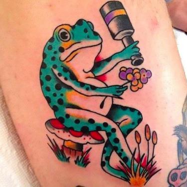 Cartoon Frog With Flowers Tattoo