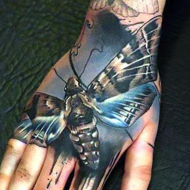 Moth on Hand and Wrist Tattoo