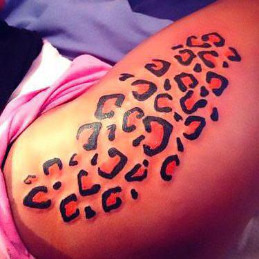 Cheetah Print on Thigh Tattoo