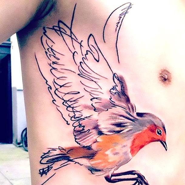 Colorful Bird on Side Tattoo Idea