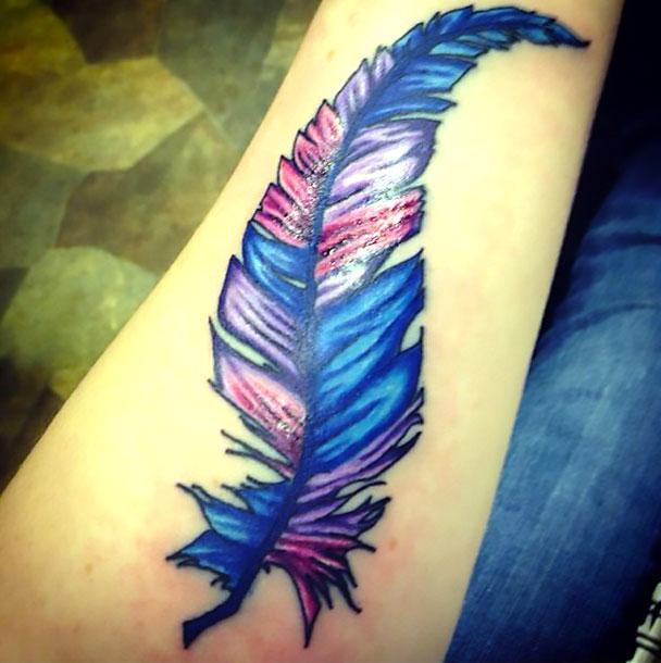 Colorful Forearm Feather Tattoo Idea