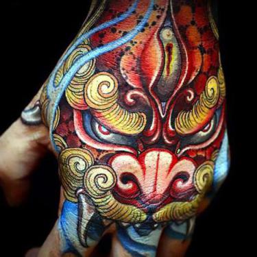 Colorful Foo Dog on Hand Tattoo