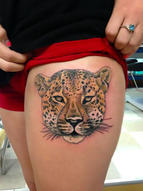 Cool Leopard Face Tattoo Idea