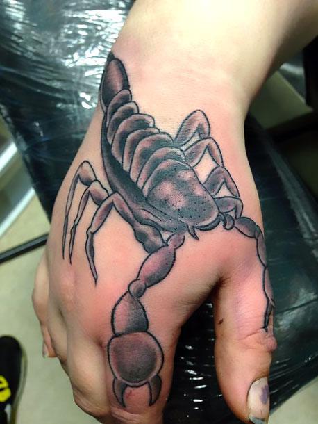 Cool Scorpion on Hand Tattoo Idea