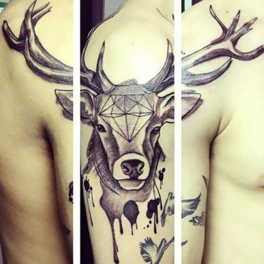 Deer Head on Arm Tattoo