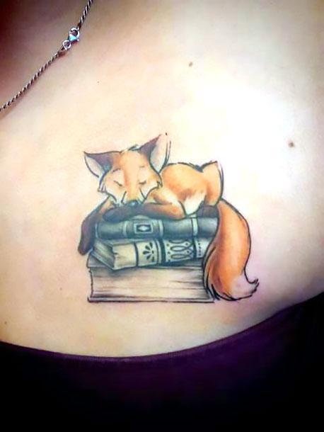 Fox Sleeping on The Books Tattoo Idea