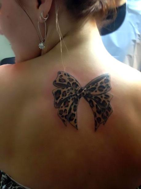 Leopard Bow on Back Tattoo Idea