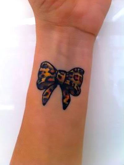 Leopard Bow on Wrist Tattoo Idea