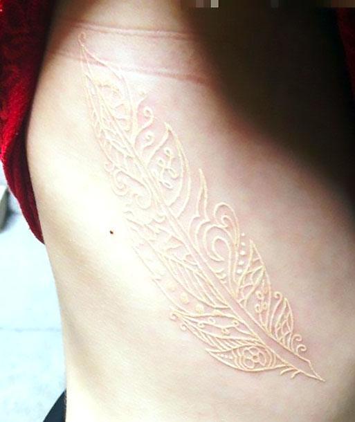 Cool White Ink Feather Tattoo Idea