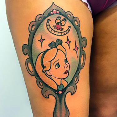 Alice and Cat on Thigh Tattoo