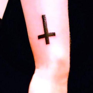 Cross on Outer Wrist Tattoo