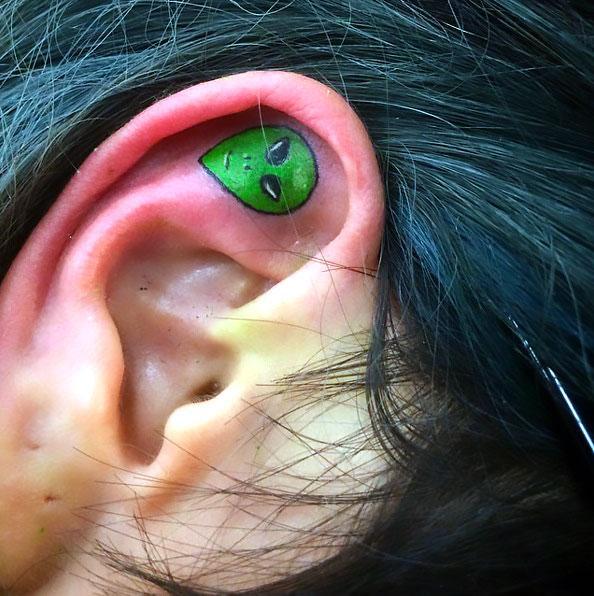 Alien on Inner Ear Tattoo Idea