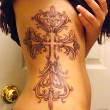 Cross on Side Tattoo