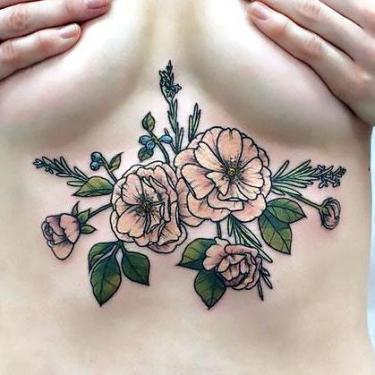 Cute Under Breast Flowers Tattoo