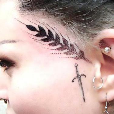 27 Incredible Face Tattoo Designs