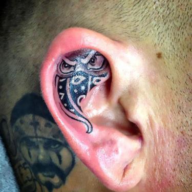 Tribal Owl Ear Tattoo