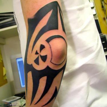 Unique Elbow Tattoo