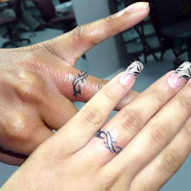 Wedding Rings on Figers Tattoo