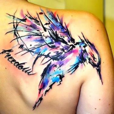 Amazing Watercolor Hummingbird Tattoo