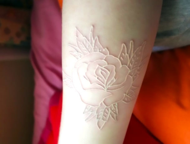 White Ink Rose on Forearm Tattoo Idea