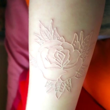 White Ink Rose on Forearm Tattoo