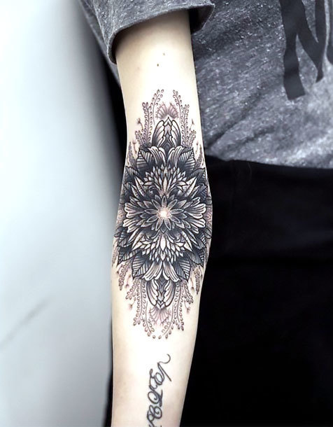 Great Flower on Elbow Tattoo Idea