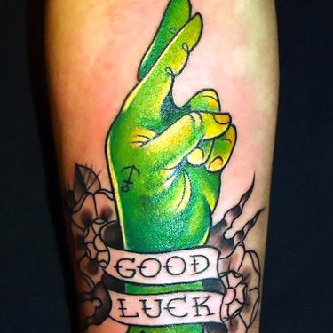 Green Good Luck Hand Tattoo
