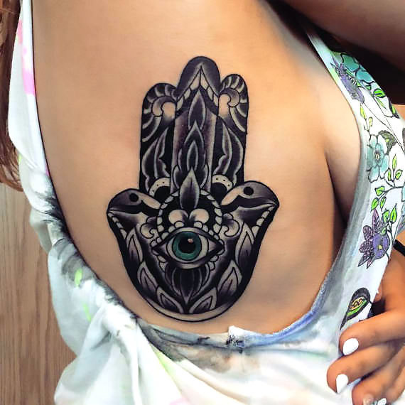 Hamsa for Women on Ribs Tattoo Idea