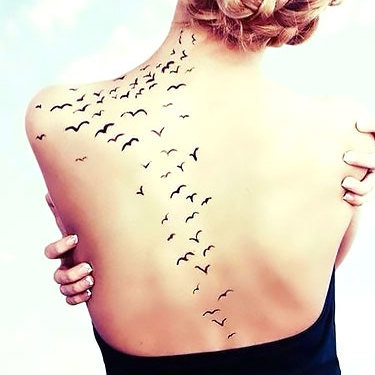 Inspiring Flock of Birds Tattoo
