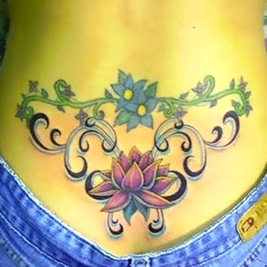 Lotus on Lower Back for Women Tattoo
