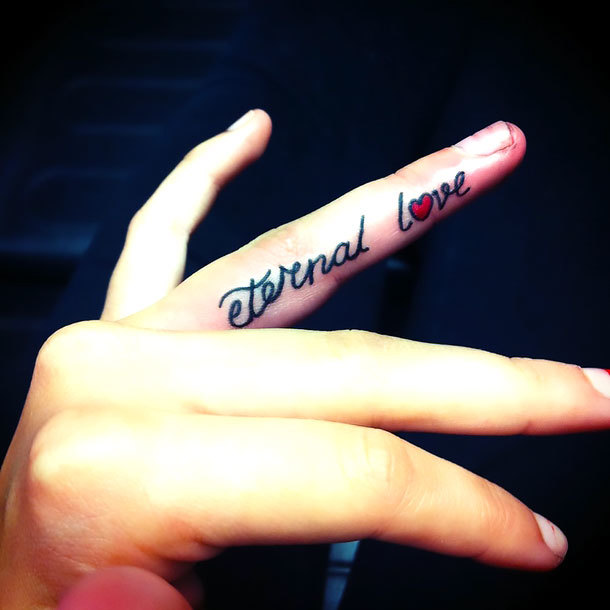 Love on Ring Finger Tattoo Idea